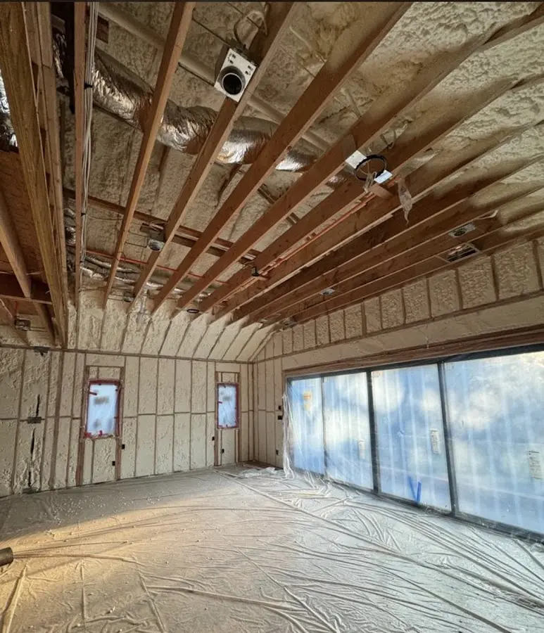 Interior walls and ceiling insulated with spray foam during new construction in Bonner Springs